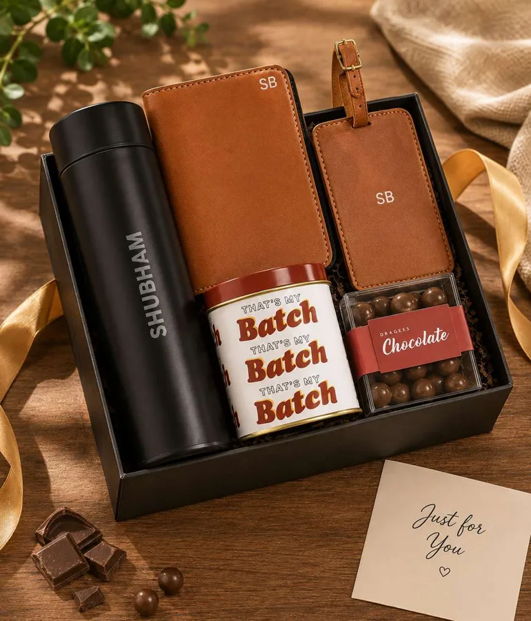 Diwali hamper with bottle, leather diary and chocolates