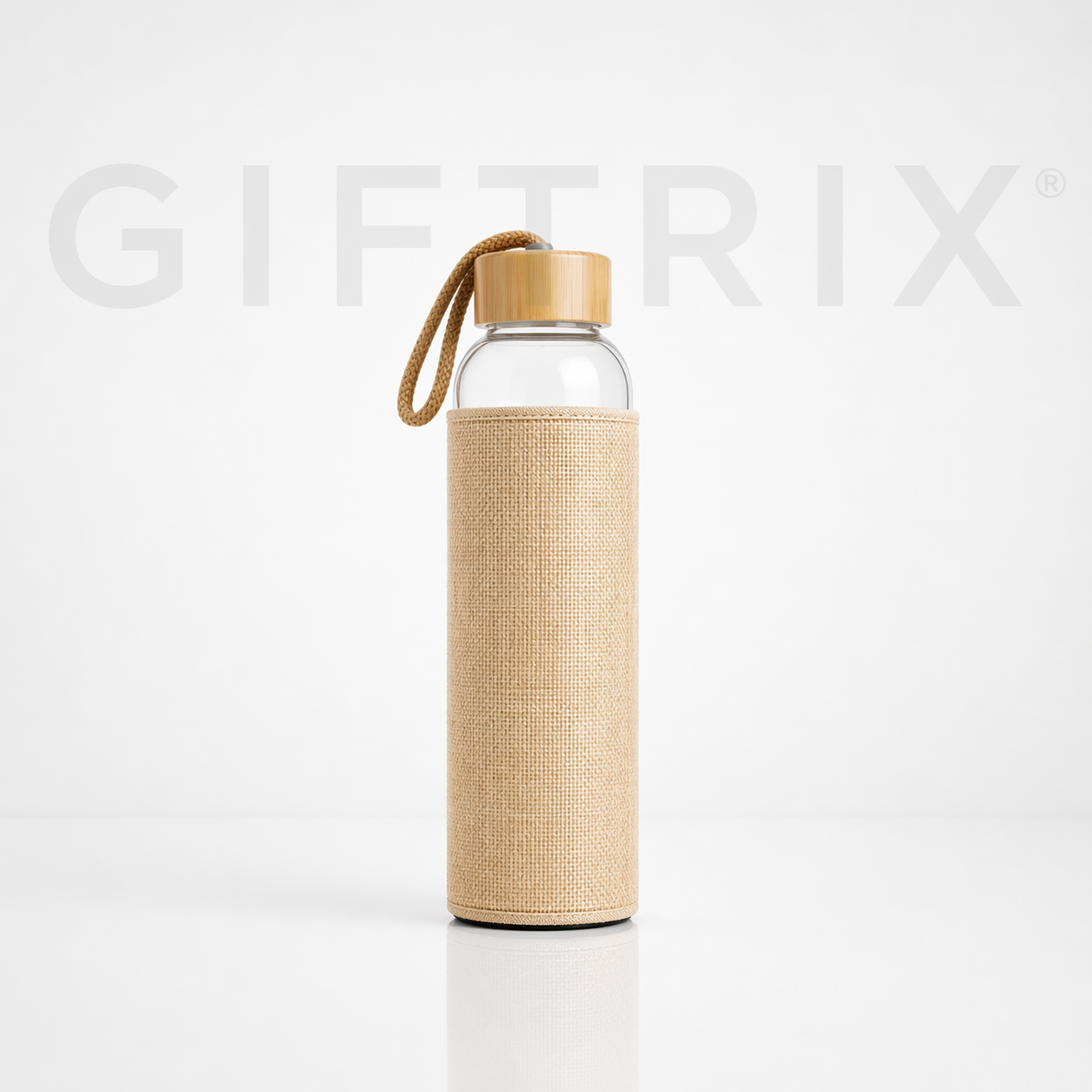 Glass bottle in jute sleeve with bamboo cap