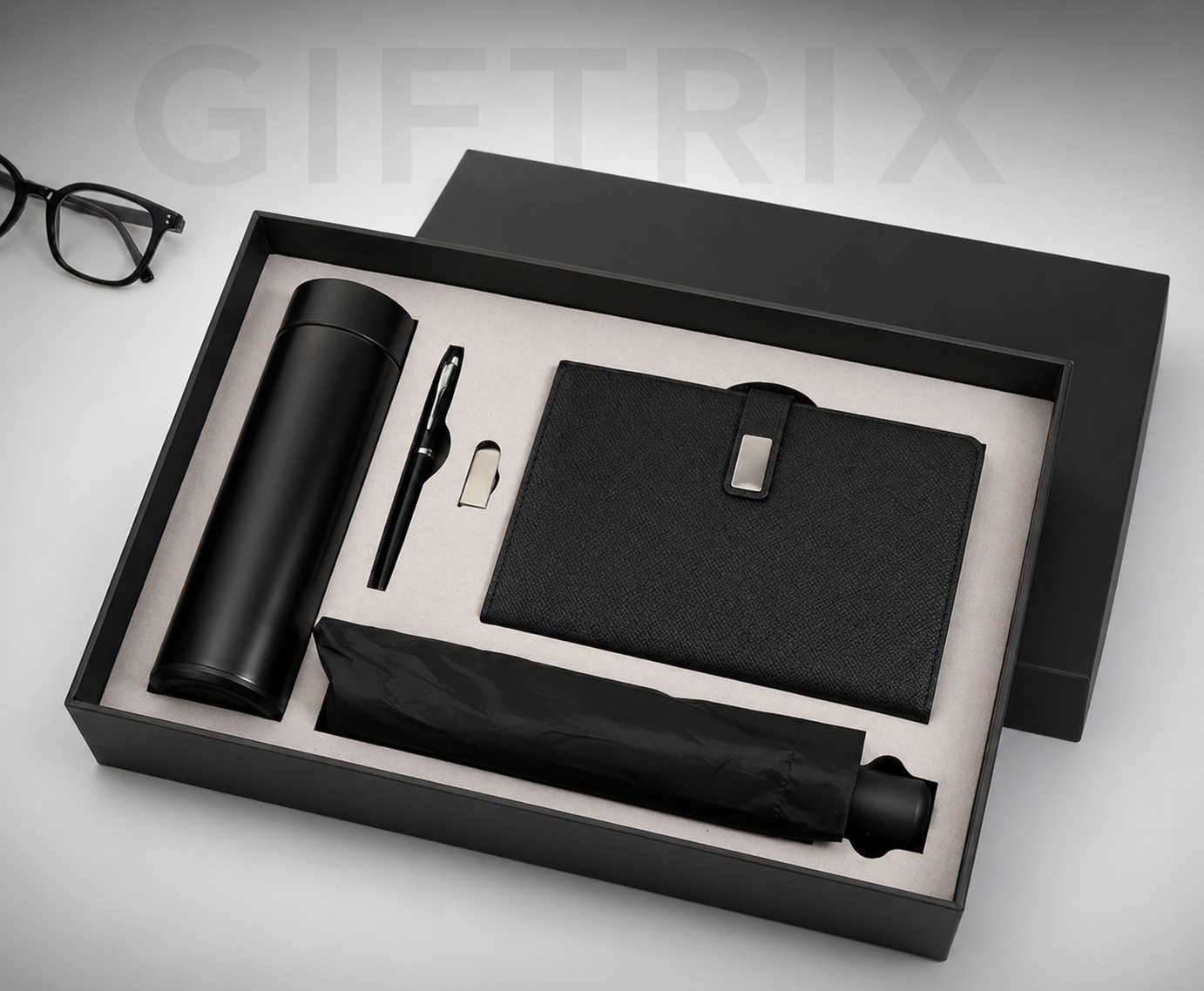 Executive combo with bottle diary keychain and folding umbrella