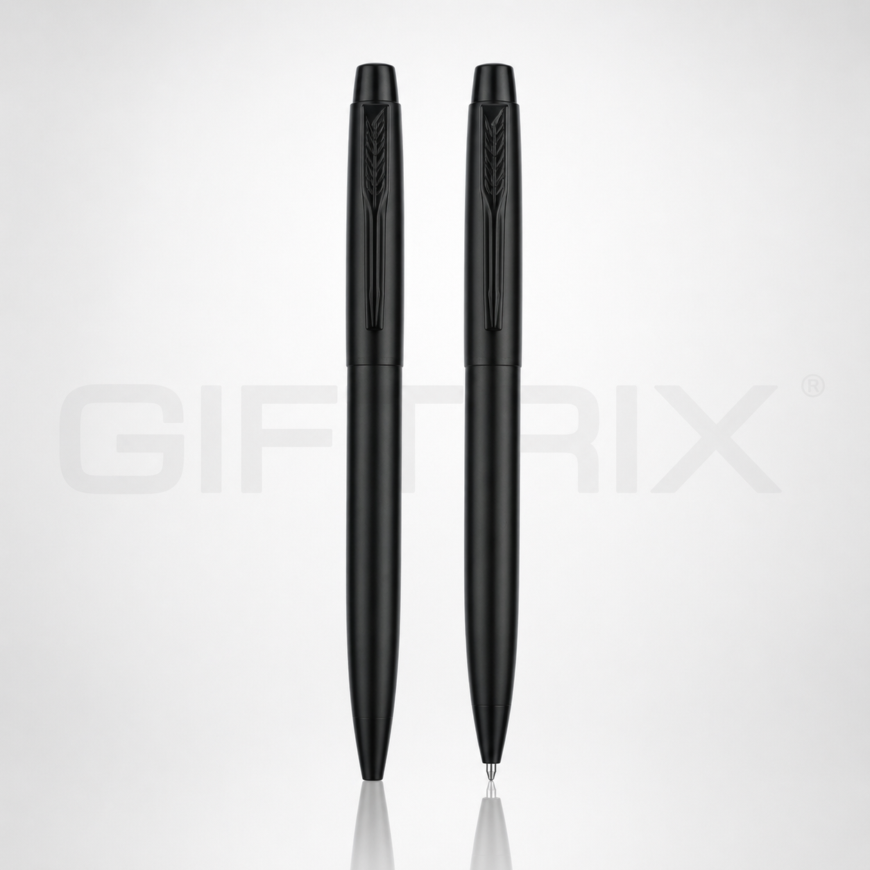 Engraved matte black pen duo with feather pattern